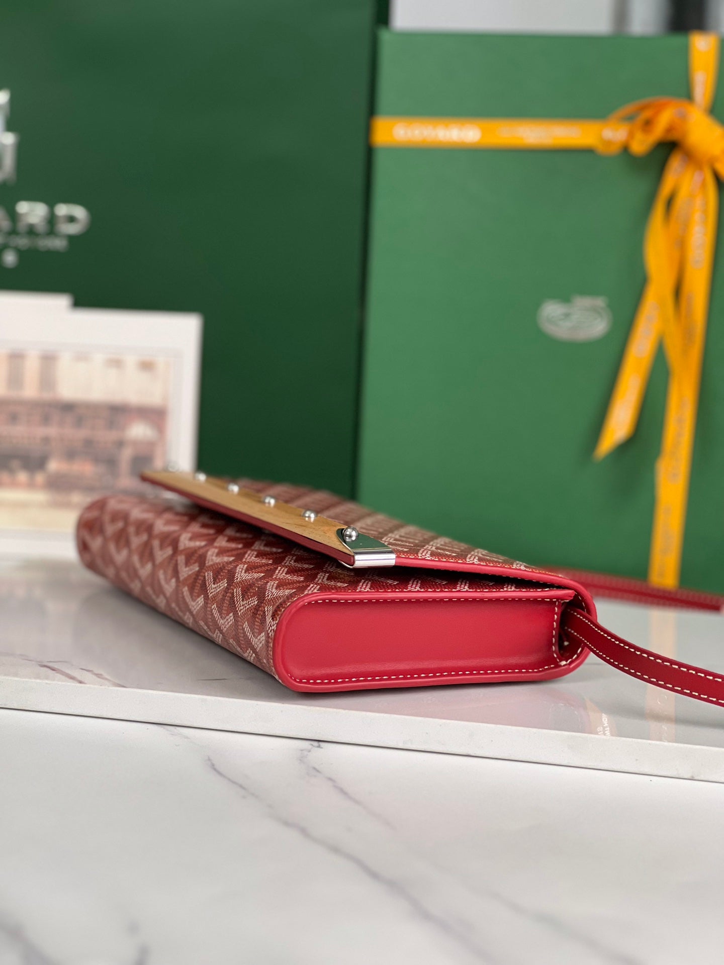 MONTE-CARLO PM CLUTCH 25 IN CLASSIC RED GOYARDINE CANVAS