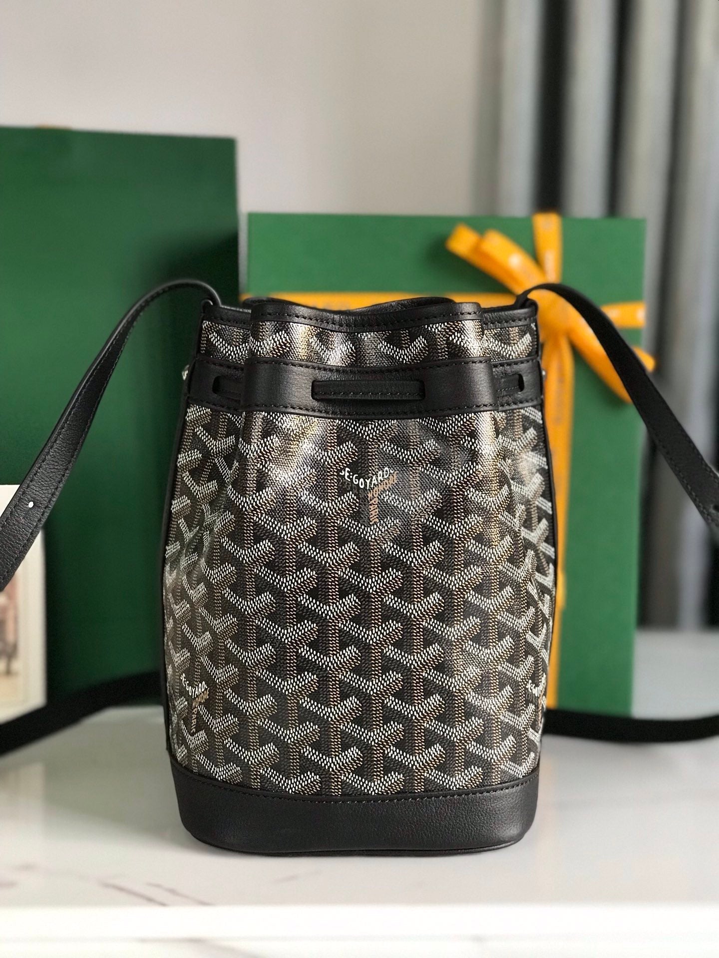 PETIT FLOT BUCKET BAG 22 IN BLACK GOYARDINE CANVAS AND LAMBSKIN TRIM