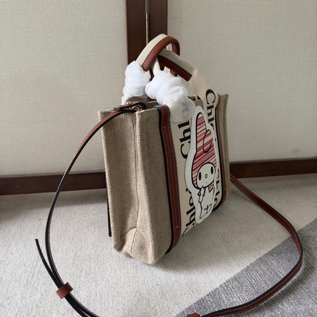 MY MELODY SMALL WOODY TOTE BAG 26.5 IN NATURAL FIBERS BEIGE WEBBING BROWN CALFSKIN