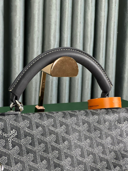 SAINT LÉGER BACKPACK 35 IN BLACK GOYARDINE CANVAS AND CALFSKIN WITH CARTOON PATCH