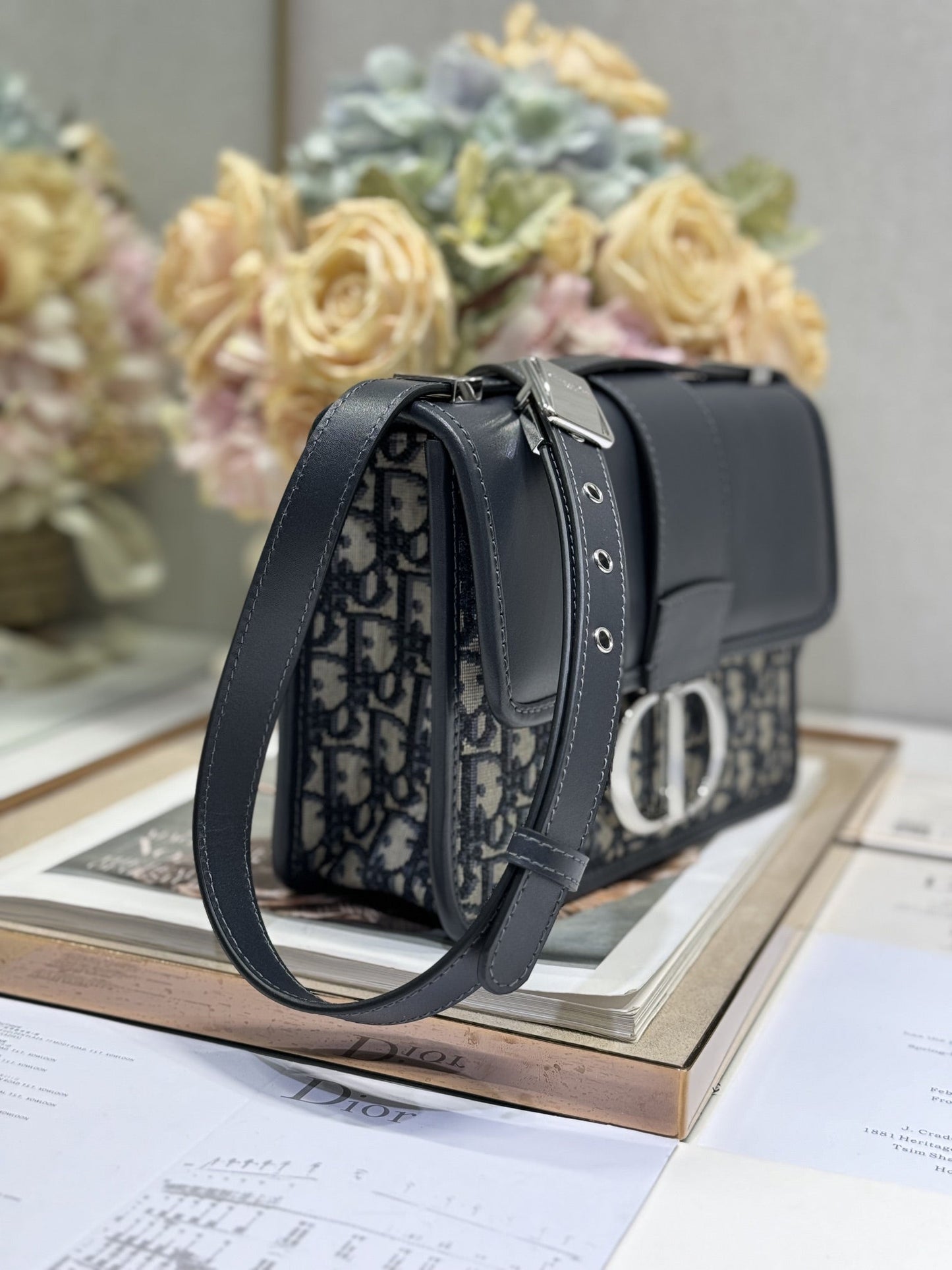 MONTAIGNE EAST-WEST BAG 24 IN BLACK LAMBSKIN AND MONOGRAM OBLIQUE JACQUARD