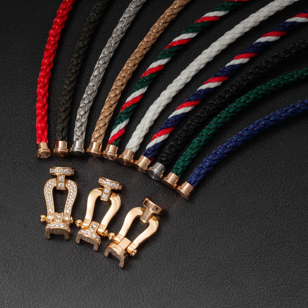 [AURORA]FORCE GROSSES HUFEISENARMBAND MIT VOLLBESATZ AUS GOLD