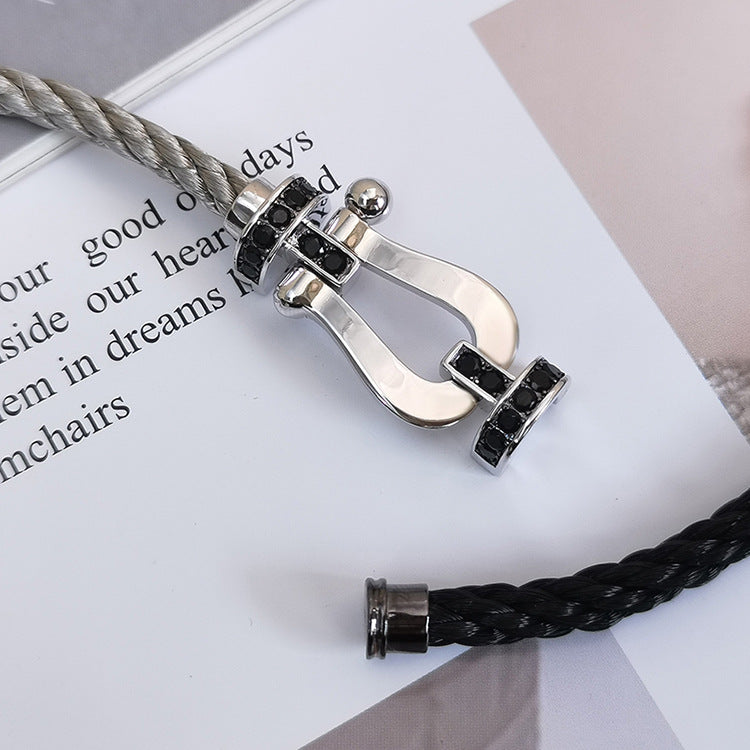 [AURORA]FORCE GROSSES HUFEISENARMBAND MIT SCHWARZEN DIAMANTEN SILBER