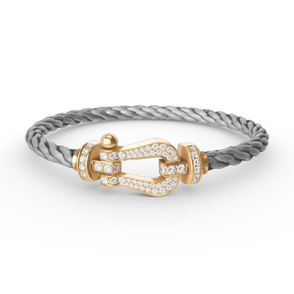 [AURORA]FORCE GROSSES HUFEISENARMBAND MIT VOLLBESATZ AUS GOLD