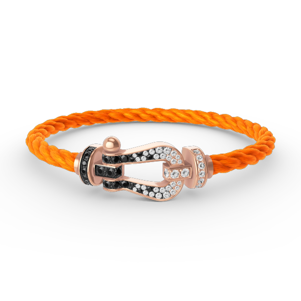 [AURORA]FORCE GROSSES HUFEISENARMBAND MIT SCHWARZ-WEISSEN DIAMANTEN UND ROSÉGOLD
