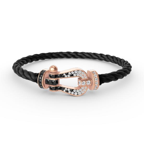 [AURORA]FORCE GROSSES HUFEISENARMBAND MIT SCHWARZ-WEISSEN DIAMANTEN UND ROSÉGOLD