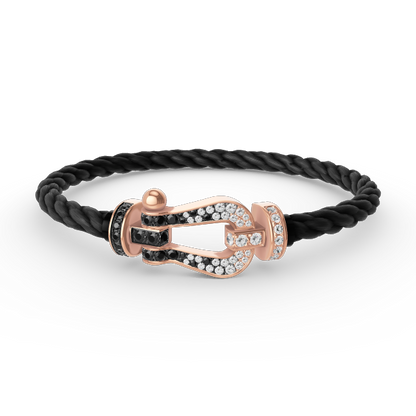 [AURORA]FORCE GROSSES HUFEISENARMBAND MIT SCHWARZ-WEISSEN DIAMANTEN UND ROSÉGOLD