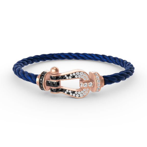 [AURORA]FORCE GROSSES HUFEISENARMBAND MIT SCHWARZ-WEISSEN DIAMANTEN UND ROSÉGOLD