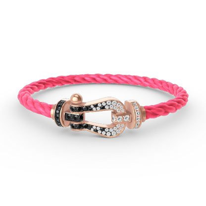 [AURORA]FORCE GROSSES HUFEISENARMBAND MIT SCHWARZ-WEISSEN DIAMANTEN UND ROSÉGOLD