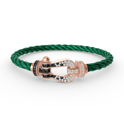 [AURORA]FORCE GROSSES HUFEISENARMBAND MIT SCHWARZ-WEISSEN DIAMANTEN UND ROSÉGOLD